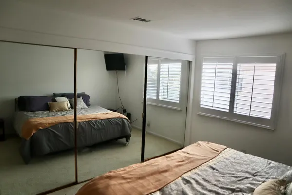 a kitchen with a sink and large window