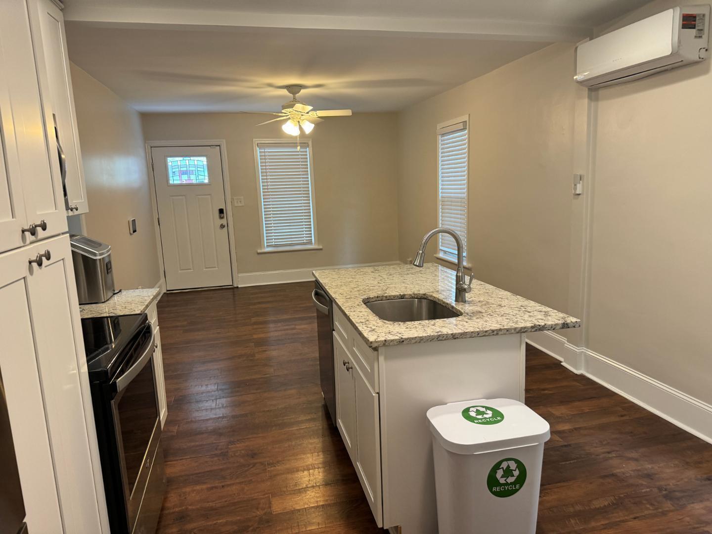 1218 Pender Street Raleigh, NC 27610 - Photo 16 of 21 a kitchen with a sink and refrigerator