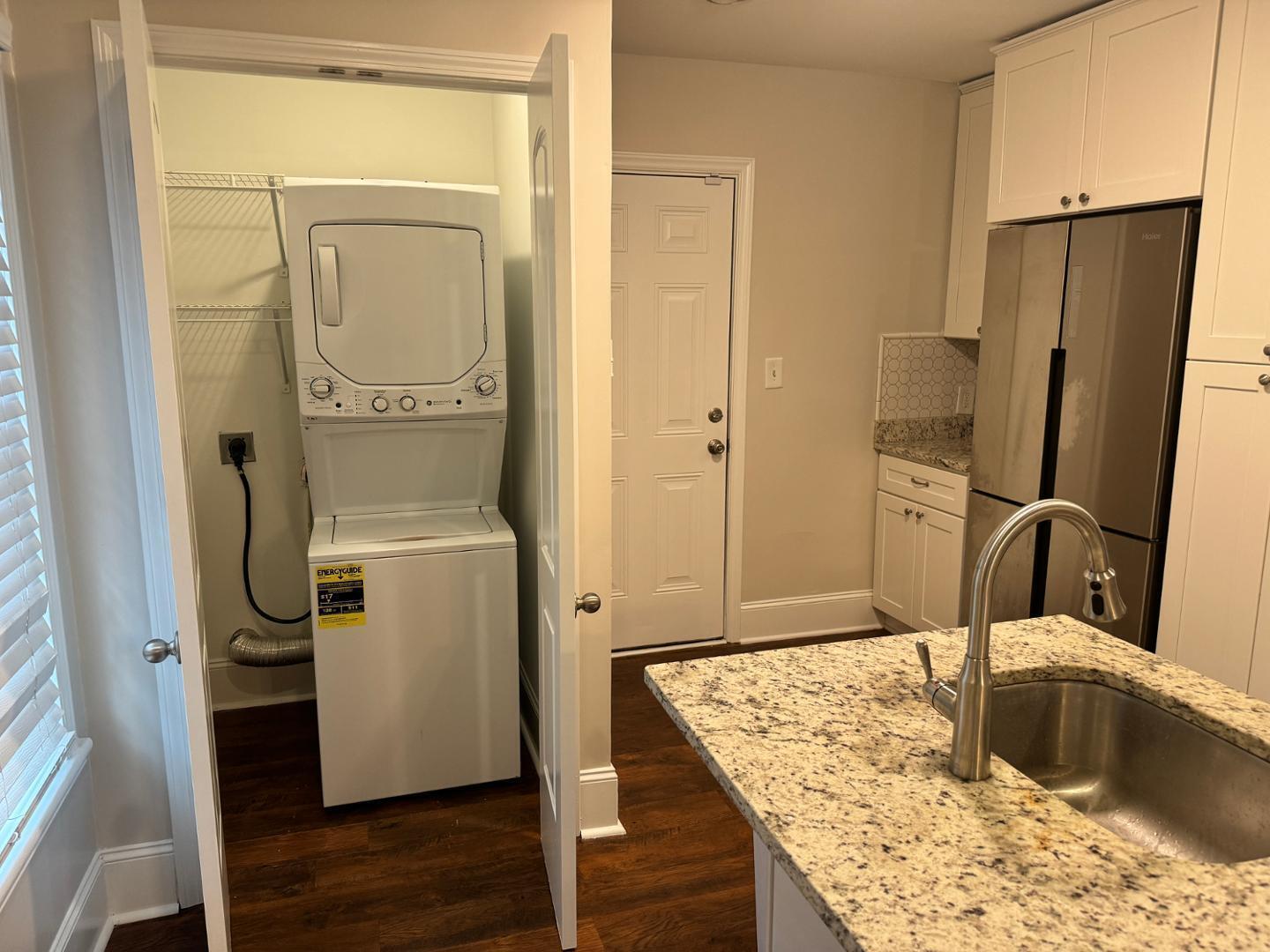 1218 Pender Street Raleigh, NC 27610 - Photo 17 of 21 a bathroom with a granite countertop sink toilet and shower