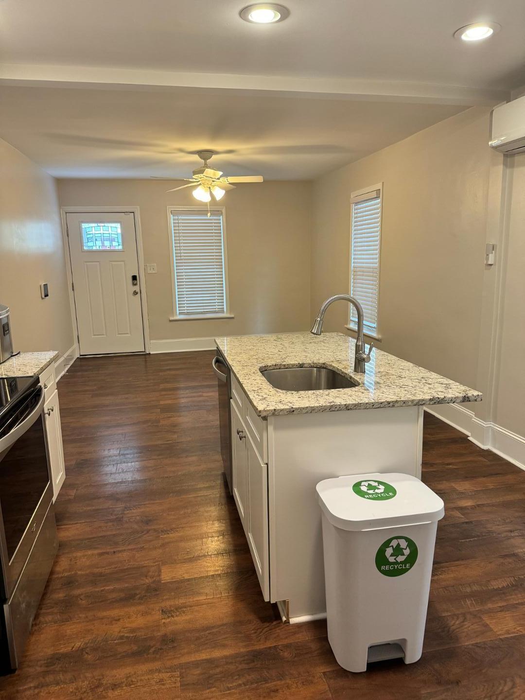 1218 Pender Street Raleigh, NC 27610 - Photo 18 of 21 a view of kitchen with wooden floor