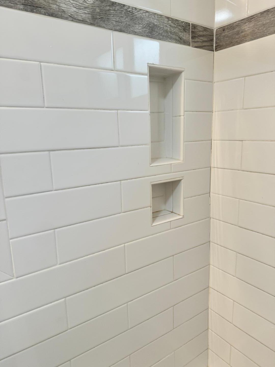 1218 Pender Street Raleigh, NC 27610 - Photo 10 of 21 a bathroom with a shower