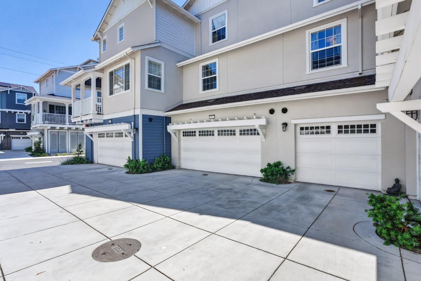 9532 Seawind Way Newark, CA 94560 - Photo 32 of 44 a front view of a building with parking space and parking space