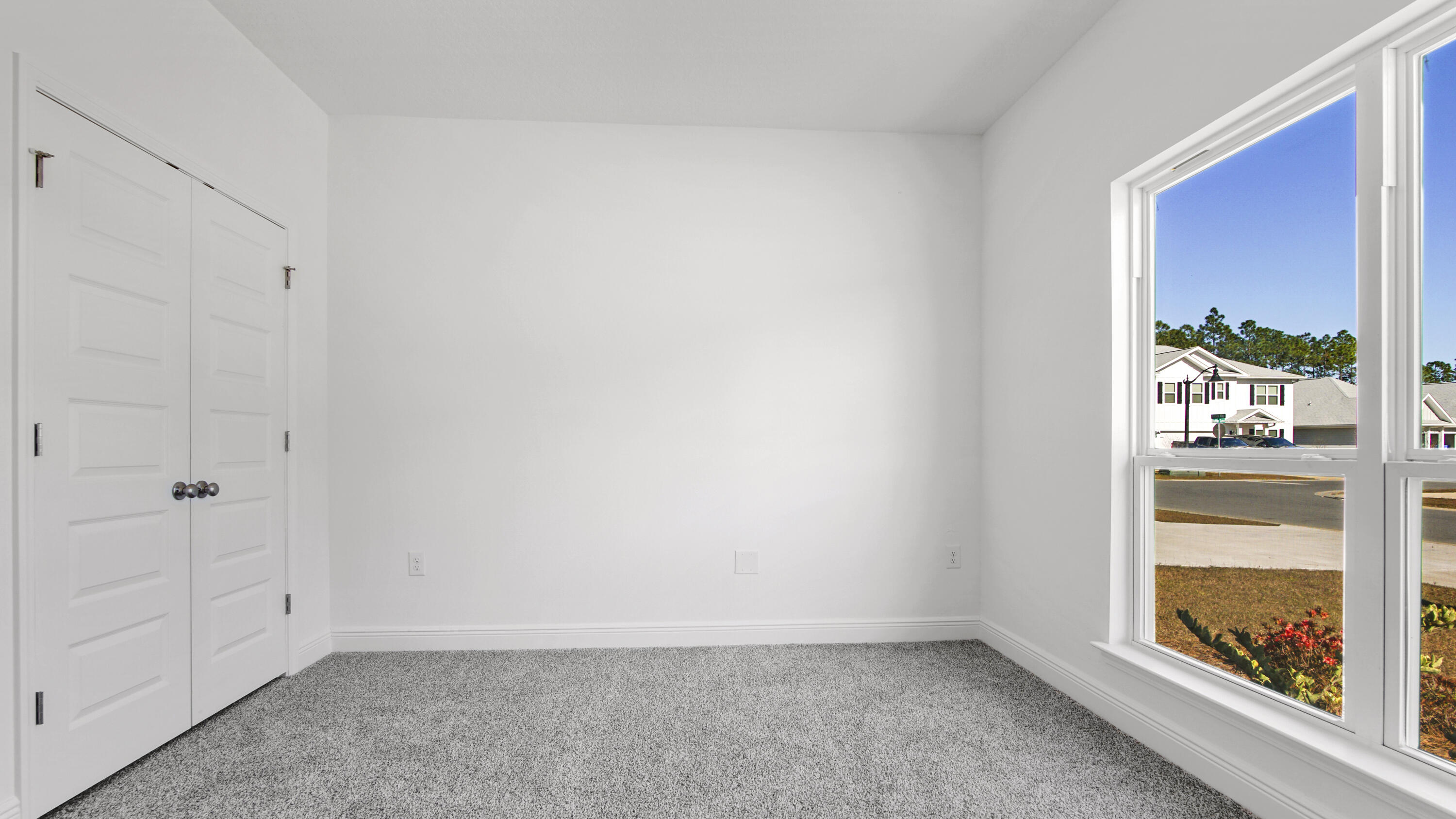 86 Grass Owl Loop Freeport, FL 32439 - Photo 21 of 34 a view of an empty room and window