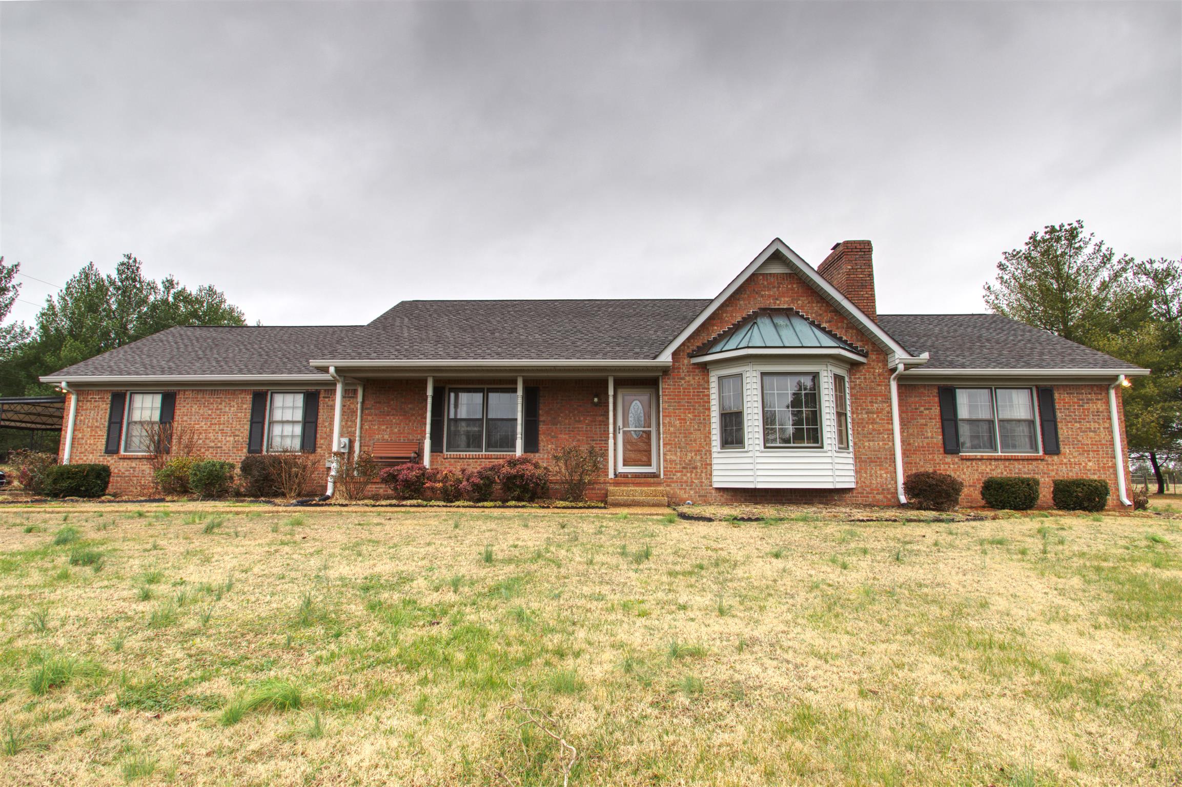 1240 McCrary Road Lebanon, TN 37090 - Photo 2 of 22 a front view of a house with a yard
