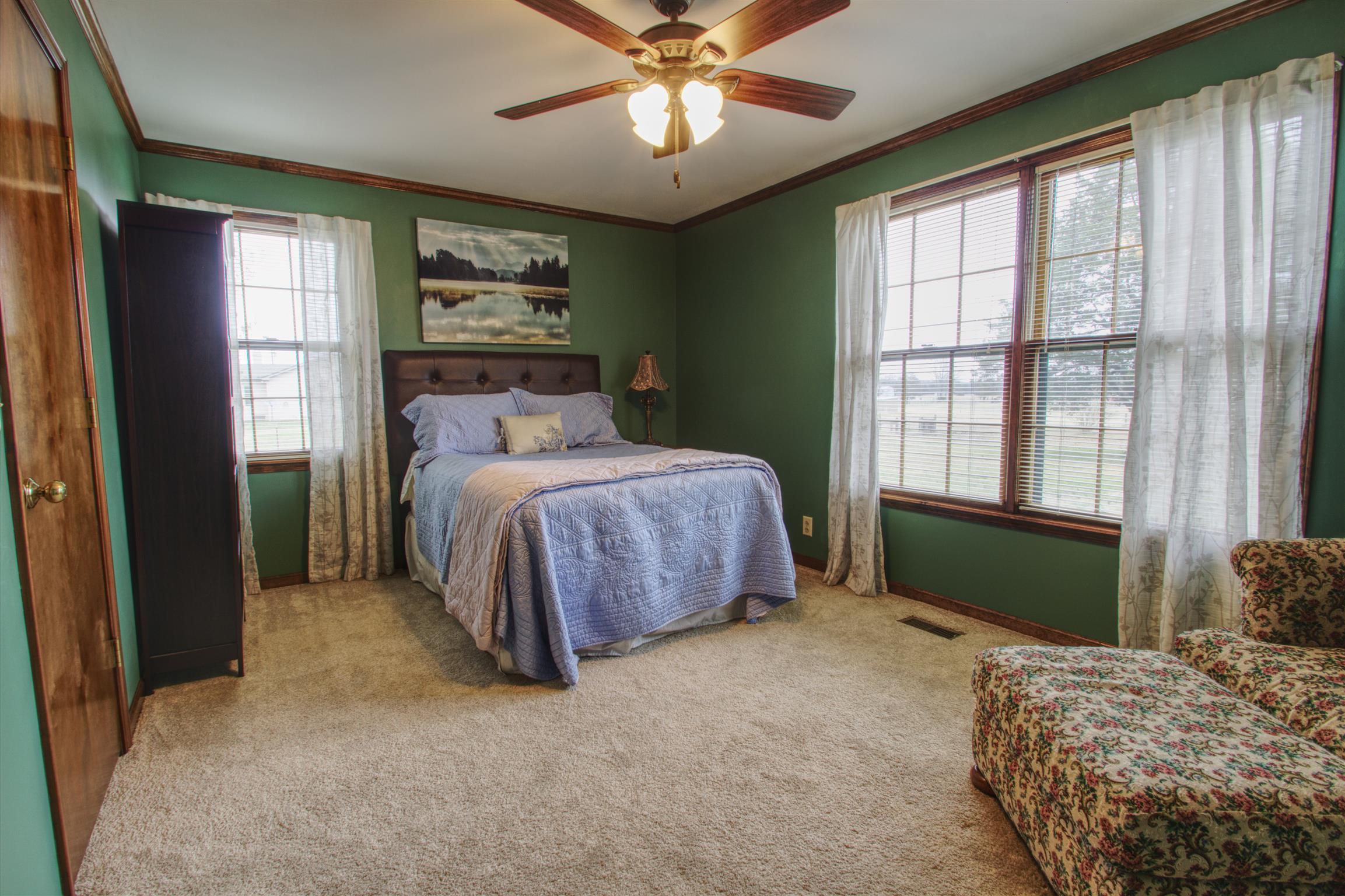 1240 McCrary Road Lebanon, TN 37090 - Photo 20 of 22 a bedroom with a bed and a large window with the outer view