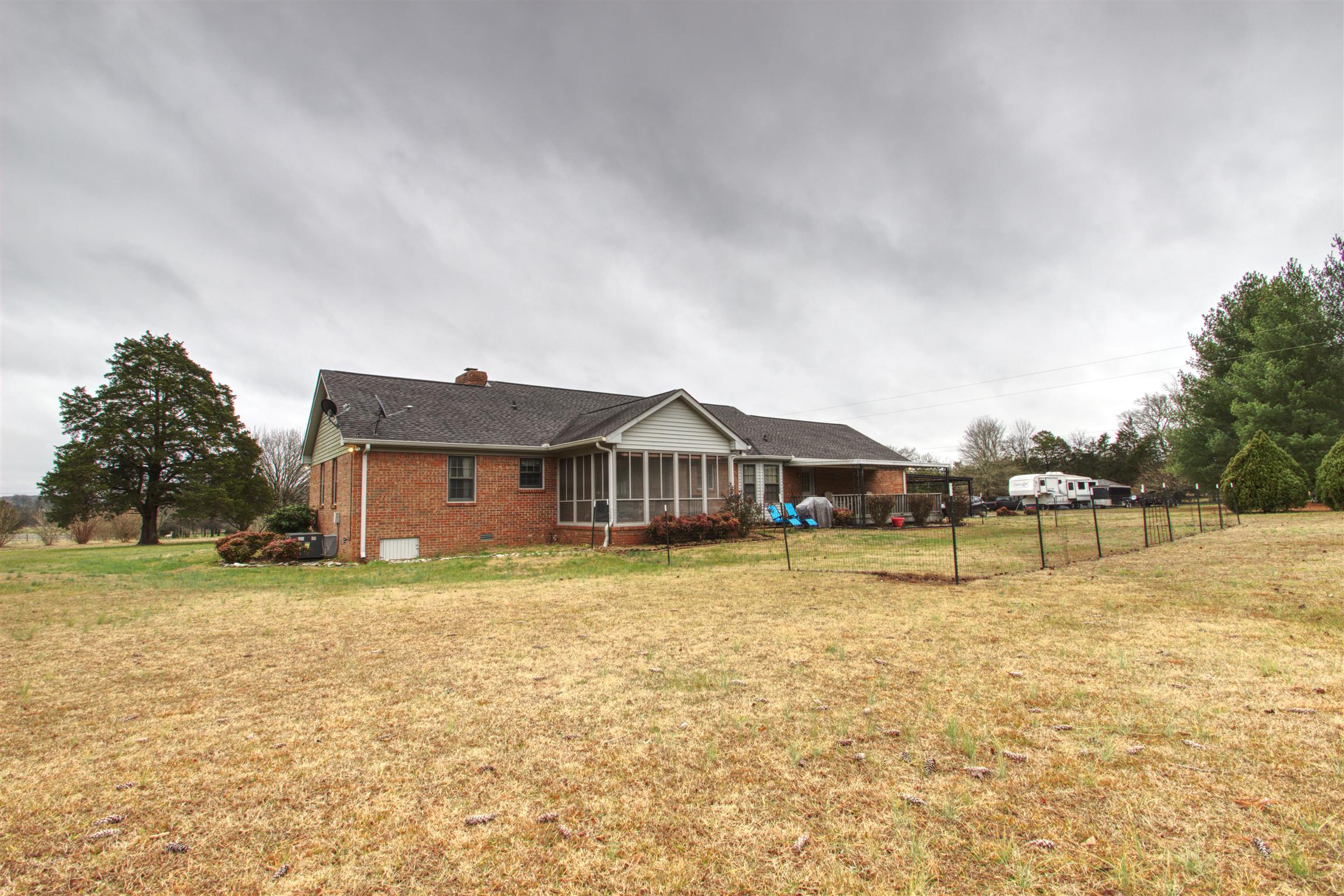 1240 McCrary Road Lebanon, TN 37090 - Photo 4 of 22 a house with a yard in front of it