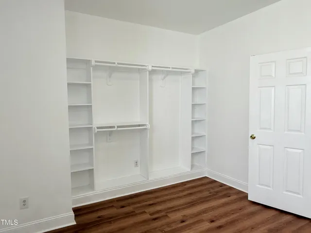 a view of kitchen with wooden floor