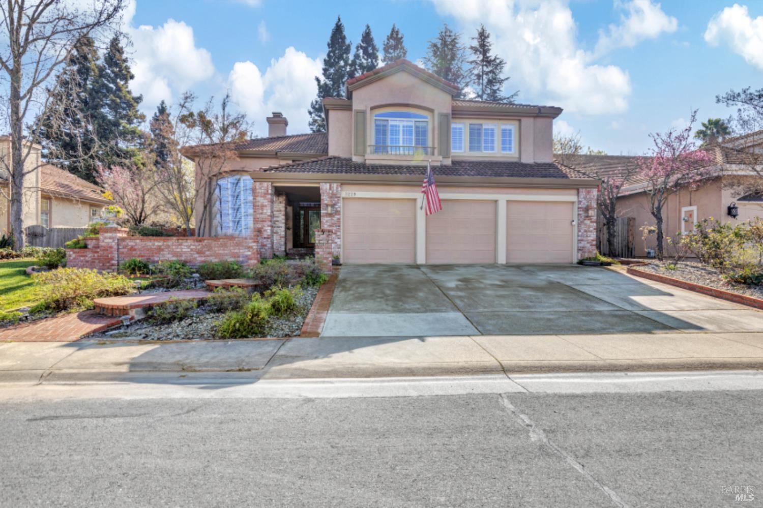 3229 Seminole Circle Fairfield, CA 94534 - Photo 1 of 73 a front view of a house with a yard and a garage