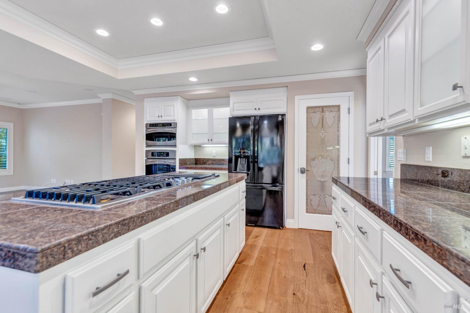 3229 Seminole Circle Fairfield, CA 94534 - Photo 18 of 73 a kitchen with stainless steel appliances granite countertop a stove and a sink