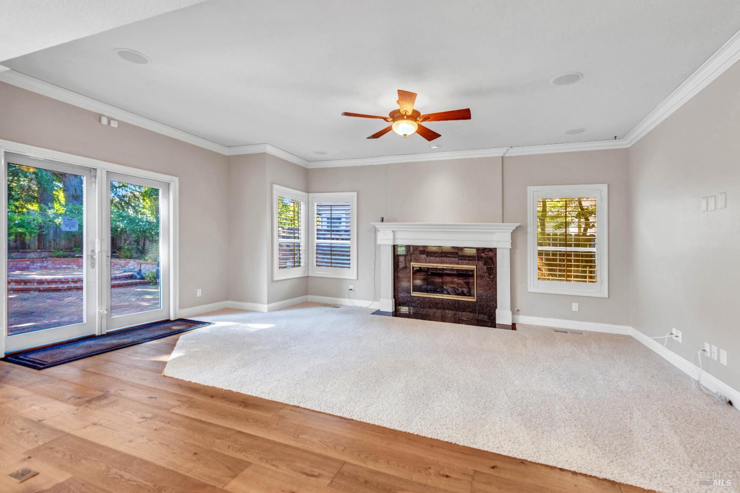 3229 Seminole Circle Fairfield, CA 94534 - Photo 23 of 73 a view of an empty room with a fireplace and a window
