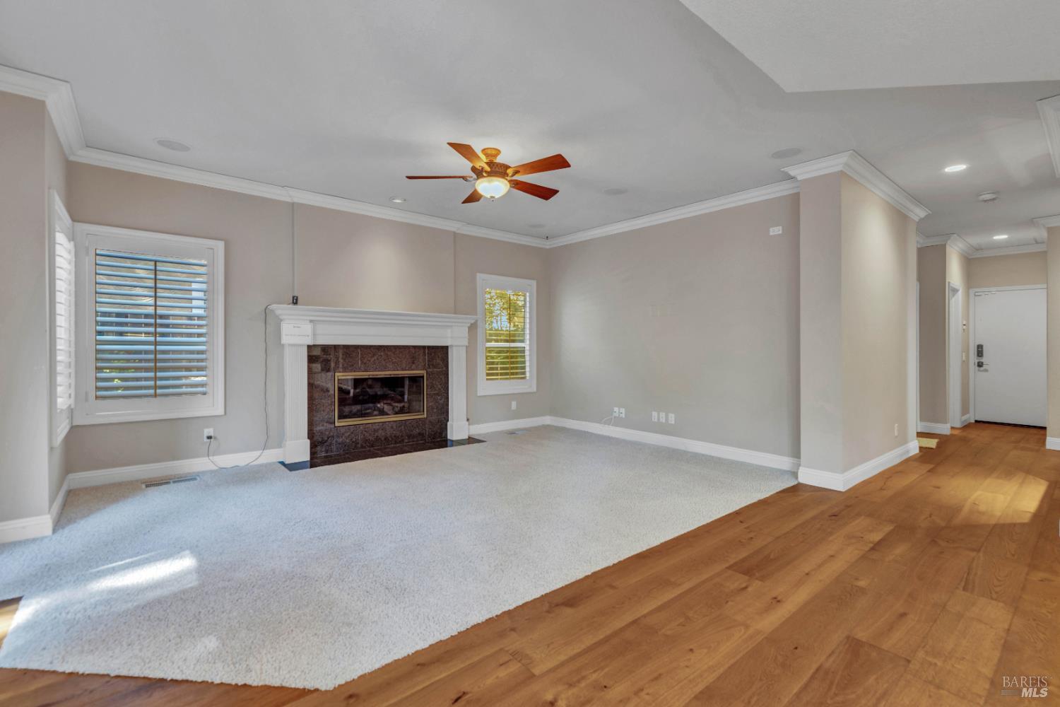 3229 Seminole Circle Fairfield, CA 94534 - Photo 24 of 73 a view of empty room with fireplace and fan