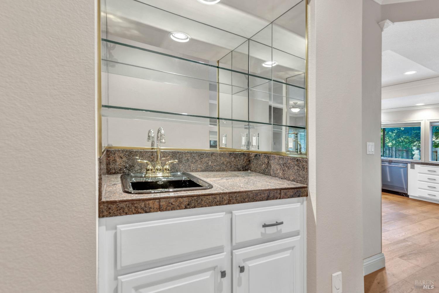 3229 Seminole Circle Fairfield, CA 94534 - Photo 25 of 73 a bathroom with a sink and a mirror