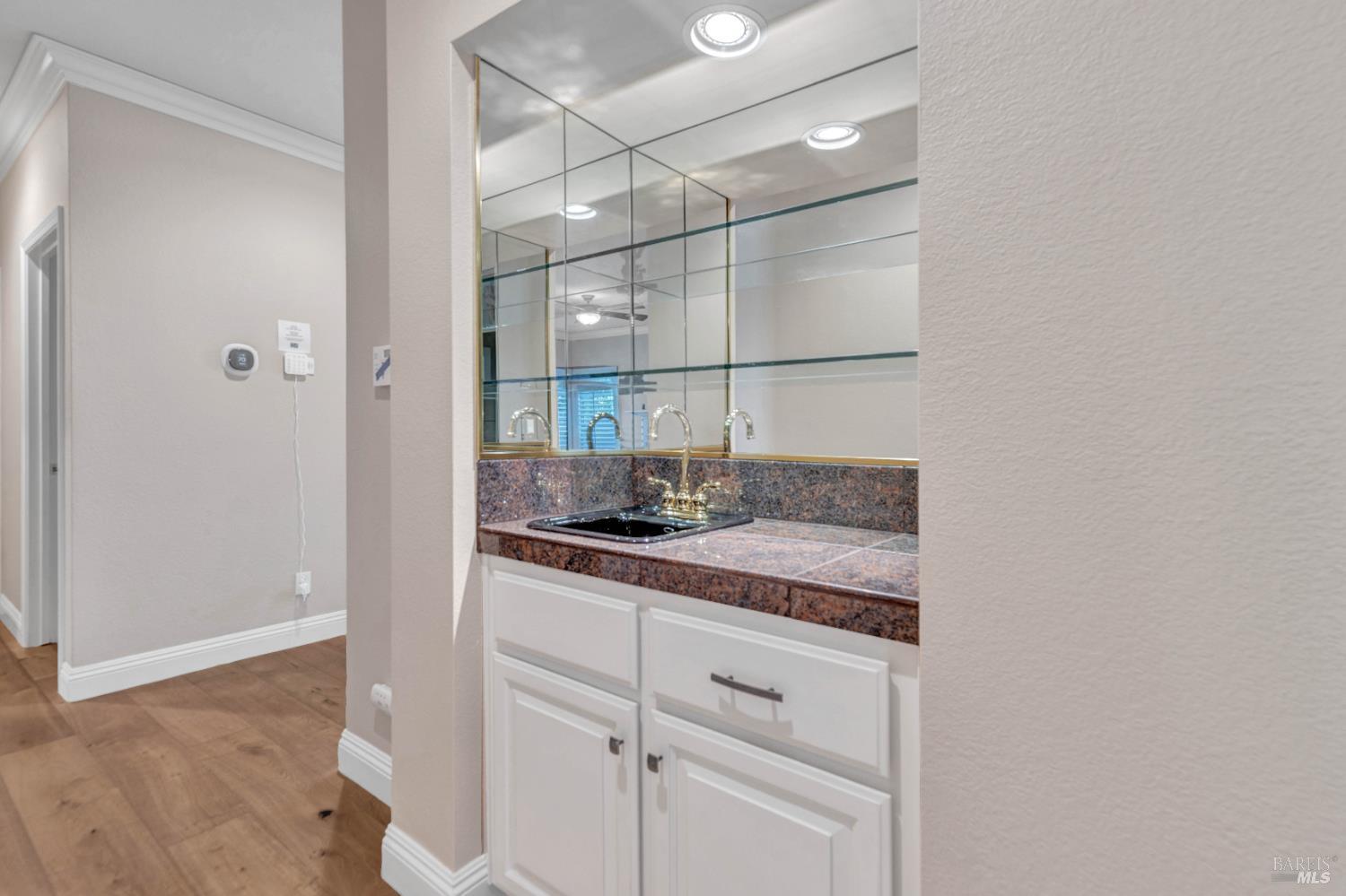 3229 Seminole Circle Fairfield, CA 94534 - Photo 26 of 73 a kitchen with a sink and cabinets