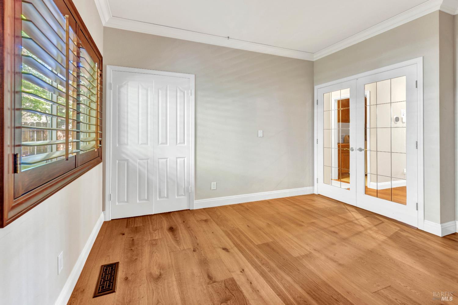 3229 Seminole Circle Fairfield, CA 94534 - Photo 27 of 73 a view of an empty room with wooden floor and a window
