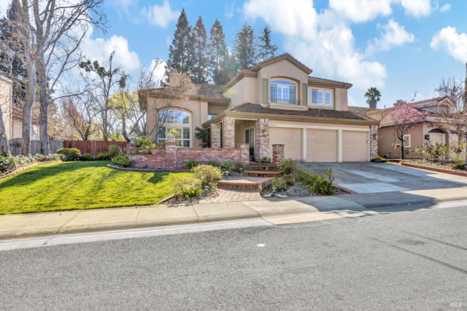 3229 Seminole Circle Fairfield, CA 94534 - Photo 5 of 73 a front view of a house with a yard and outdoor seating