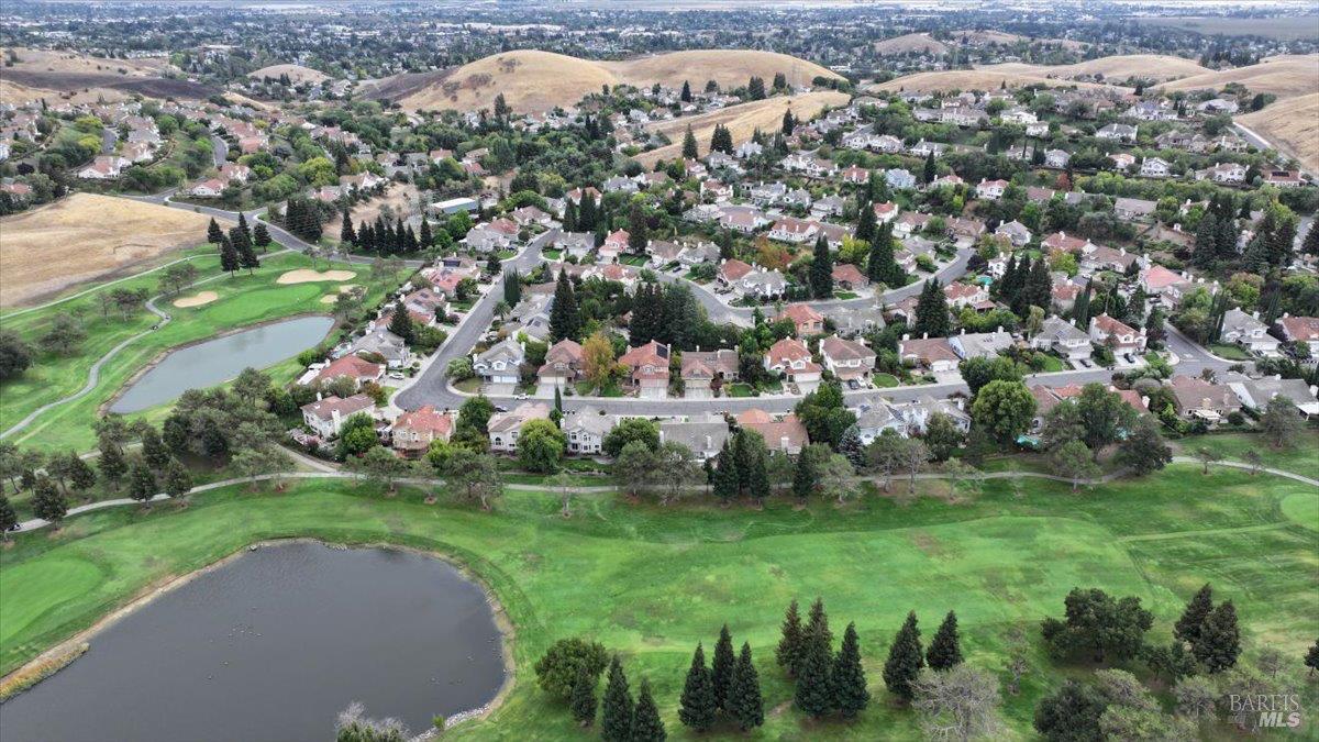 3229 Seminole Circle Fairfield, CA 94534 - Photo 67 of 73 an aerial view of residential houses with outdoor space and trees