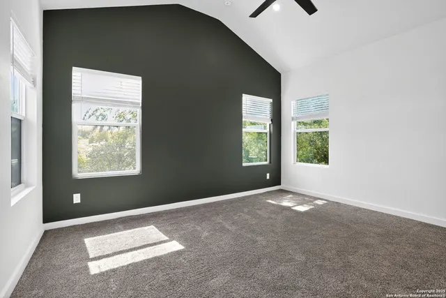 an empty room with windows