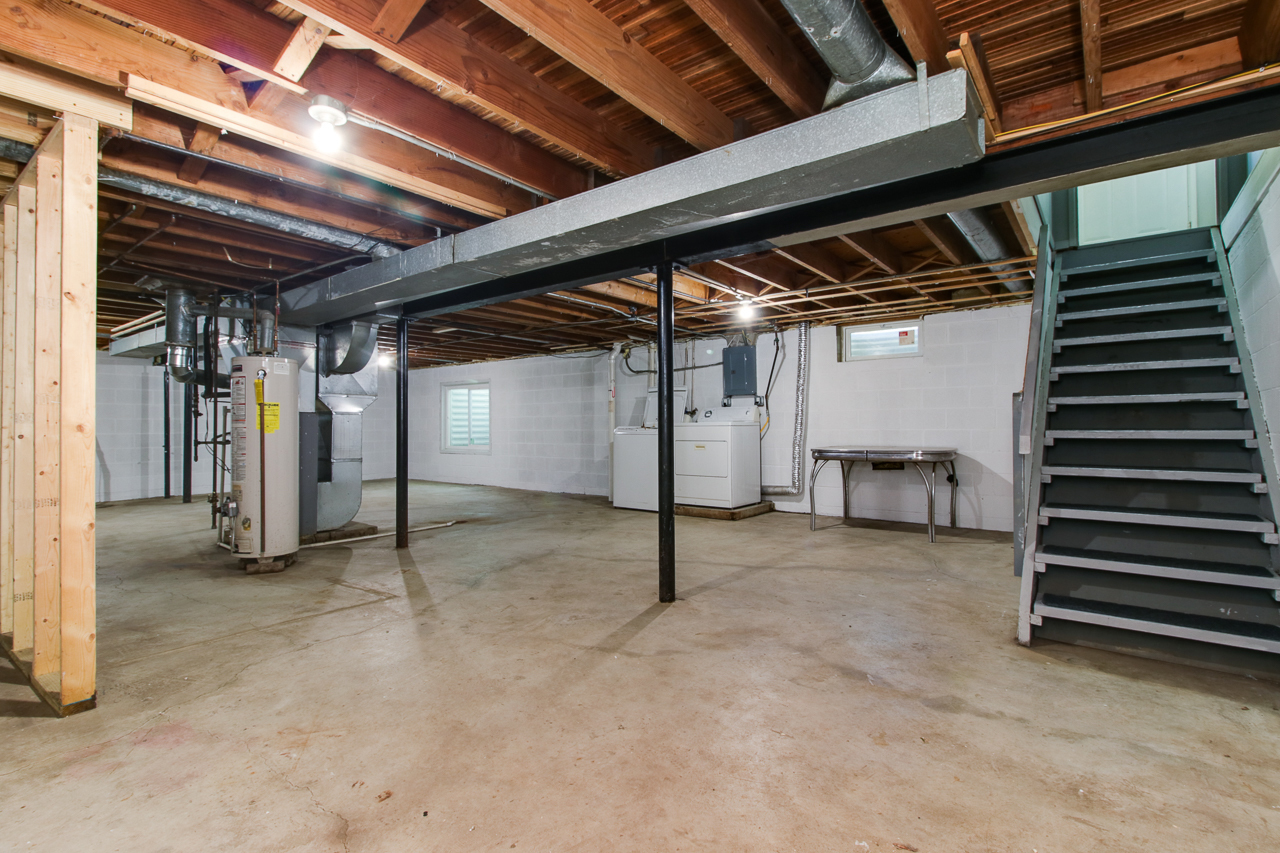 813 Parmon Road Bloomington, IL 61701 - Photo 16 of 23 a view of an empty room with wooden roof