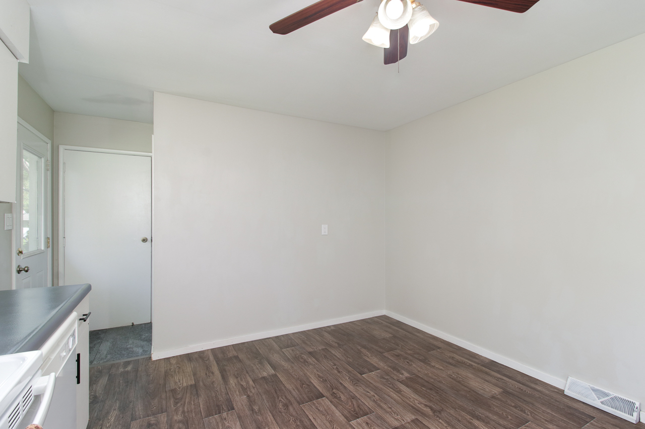 813 Parmon Road Bloomington, IL 61701 - Photo 8 of 23 wooden floor in an empty room
