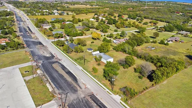 a view of balcony with wooden floor