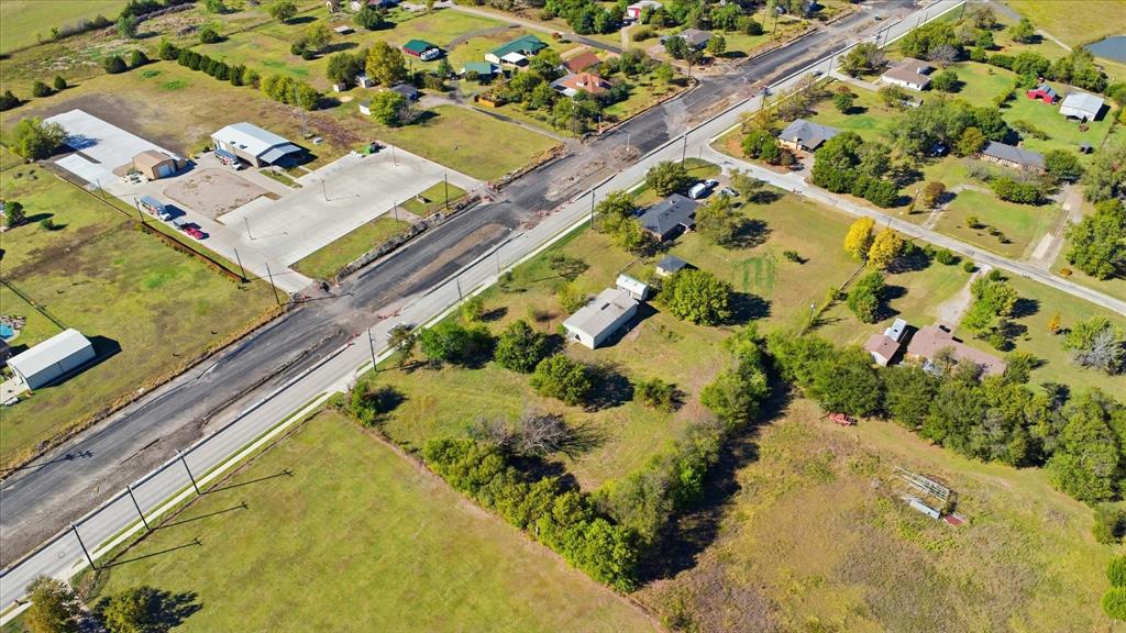 1708 Parker Road St. Paul, TX 75098 - Photo 27 of 31 a view of a swimming pool with a yard