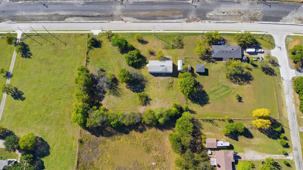 1708 Parker Road St. Paul, TX 75098 - Photo 28 of 31 a view of a swimming pool with a yard