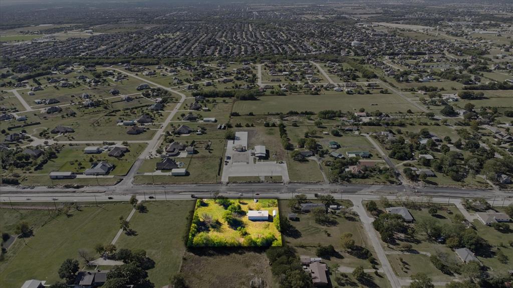 1708 Parker Road St. Paul, TX 75098 - Photo 3 of 31 an aerial view of a house with a yard