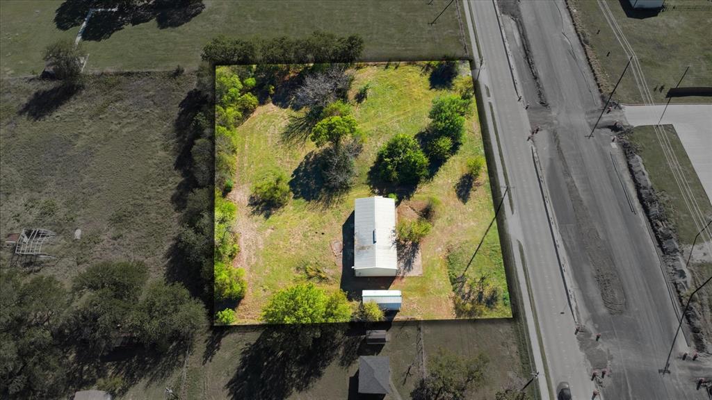 1708 Parker Road St. Paul, TX 75098 - Photo 5 of 31 an aerial view of a residential house with outdoor space