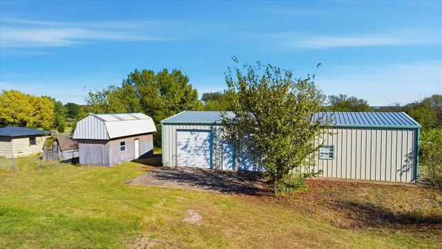 a house view with a garden space
