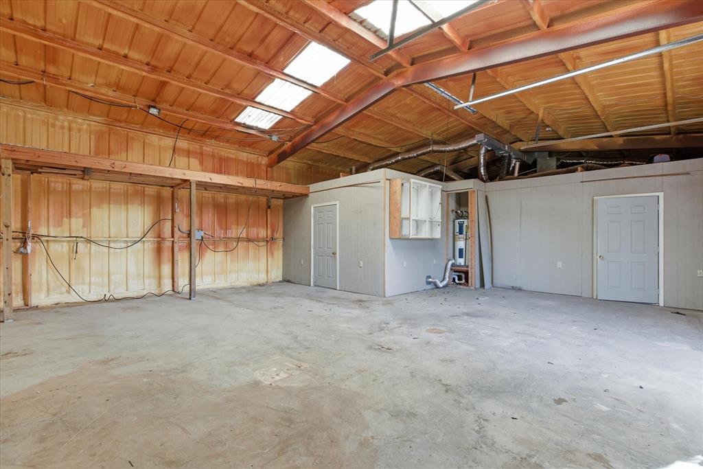 1708 Parker Road St. Paul, TX 75098 - Photo 7 of 31 a view of a room with wooden walls