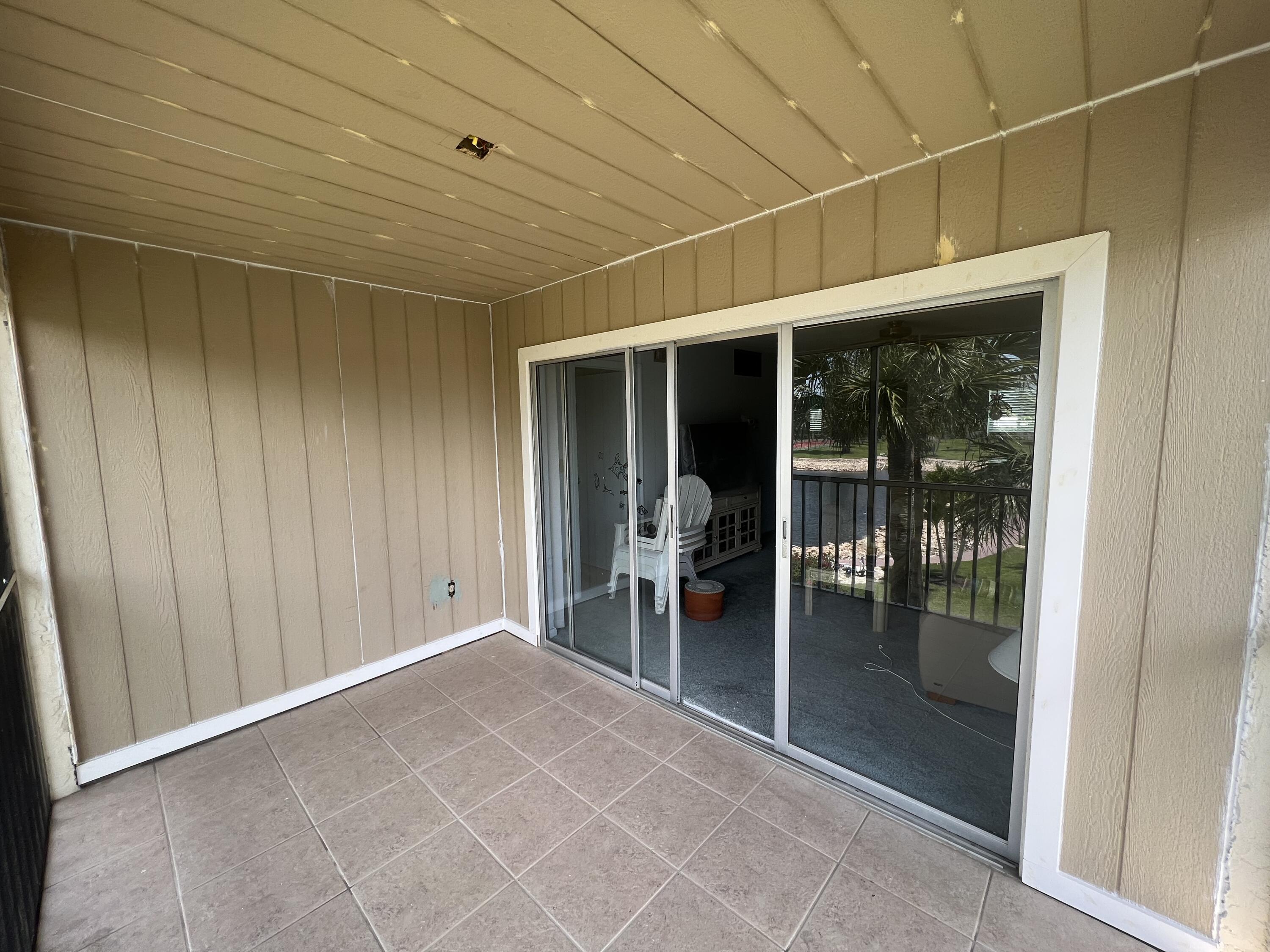 1024 Manatee Naples, Unit C301 Naples, FL 34114 - Photo 11 of 23 a view of a porch