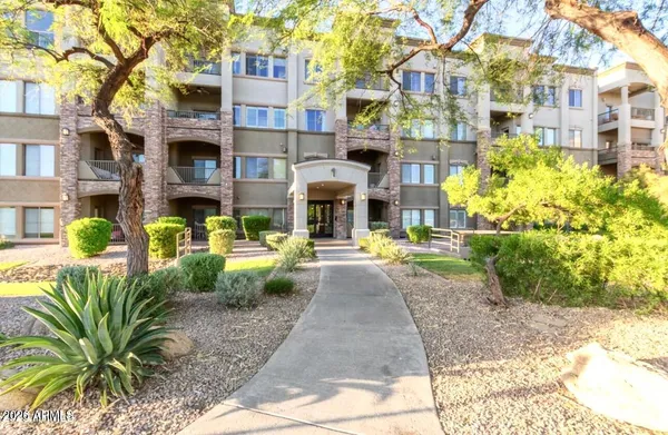 a front view of a multi story residential apartment building