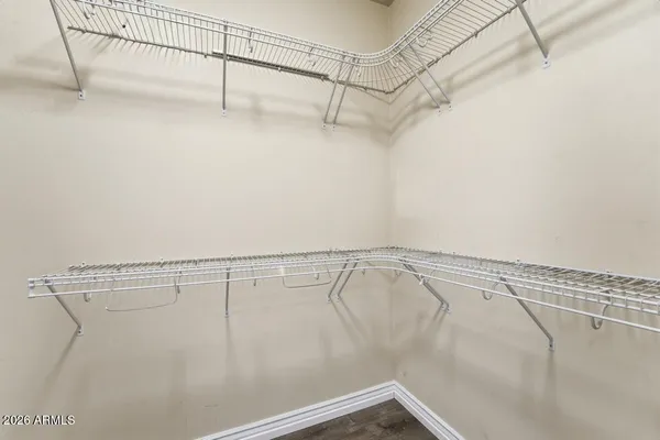 a view of a room with racks on the wall