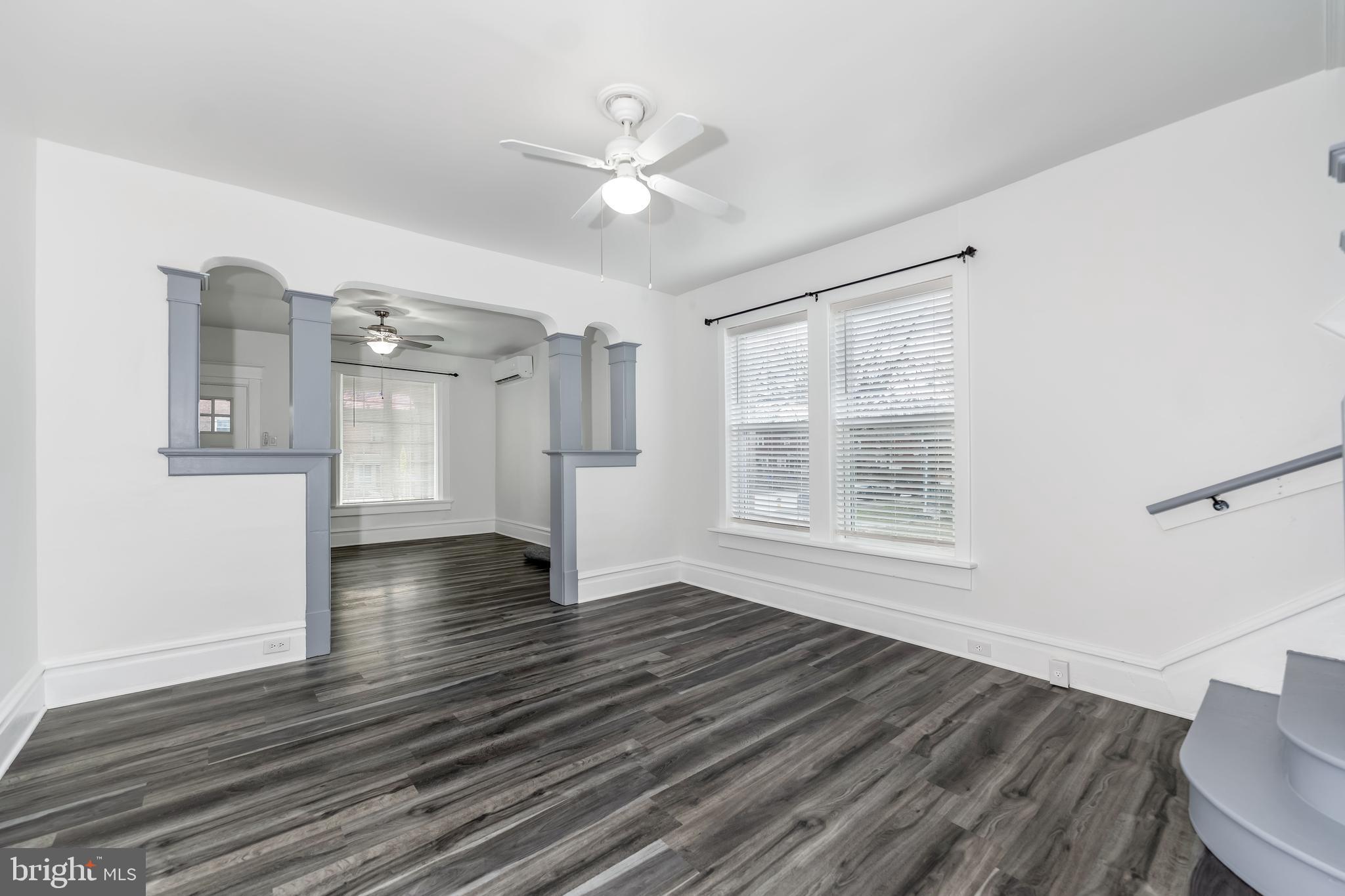 2500 Derry Street Harrisburg, PA 17111 - Photo 8 of 30 a view of an empty room with wooden floor and a window