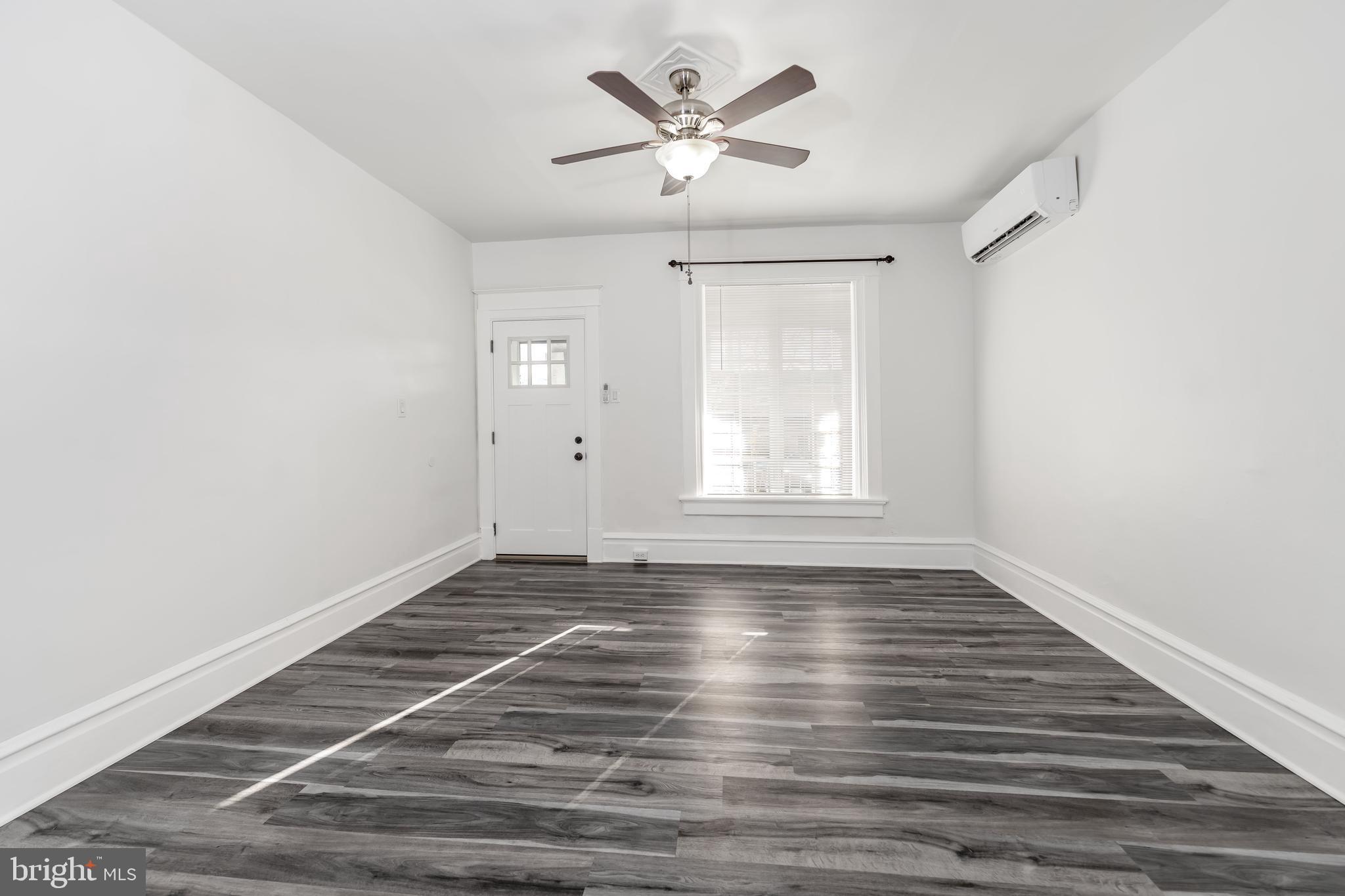 2500 Derry Street Harrisburg, PA 17111 - Photo 10 of 30 a view of an empty room with a window and a ceiling fan