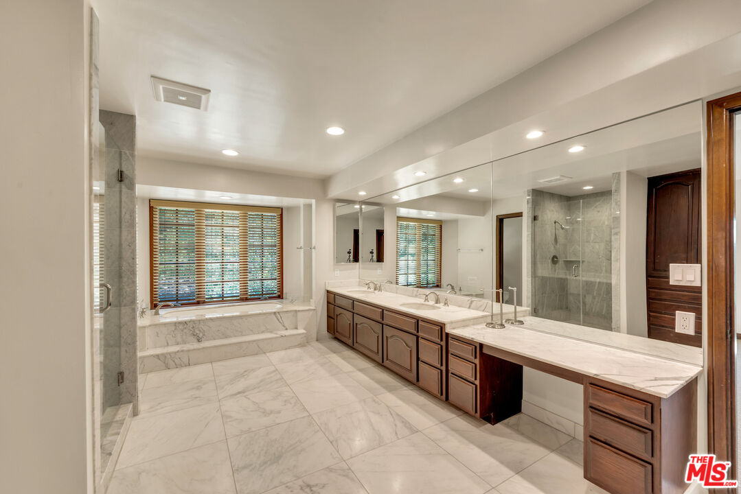 3274 Hutton Drive Beverly Hills, CA 90210 - Photo 15 of 23 a large bathroom with a large tub sink shower and double