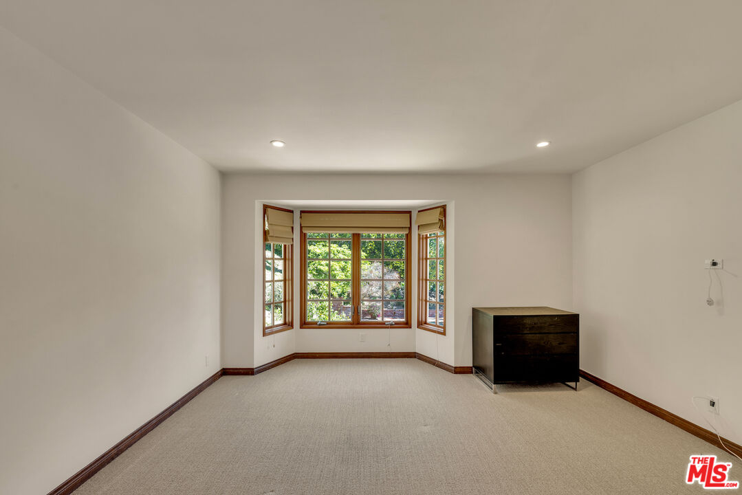 3274 Hutton Drive Beverly Hills, CA 90210 - Photo 20 of 23 a view of an empty room with a window
