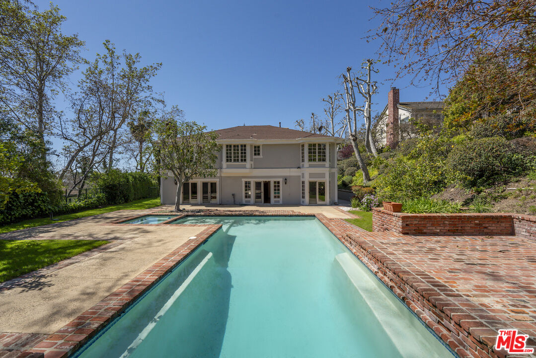 3274 Hutton Drive Beverly Hills, CA 90210 - Photo 2 of 23 a view of a house with pool and sitting area