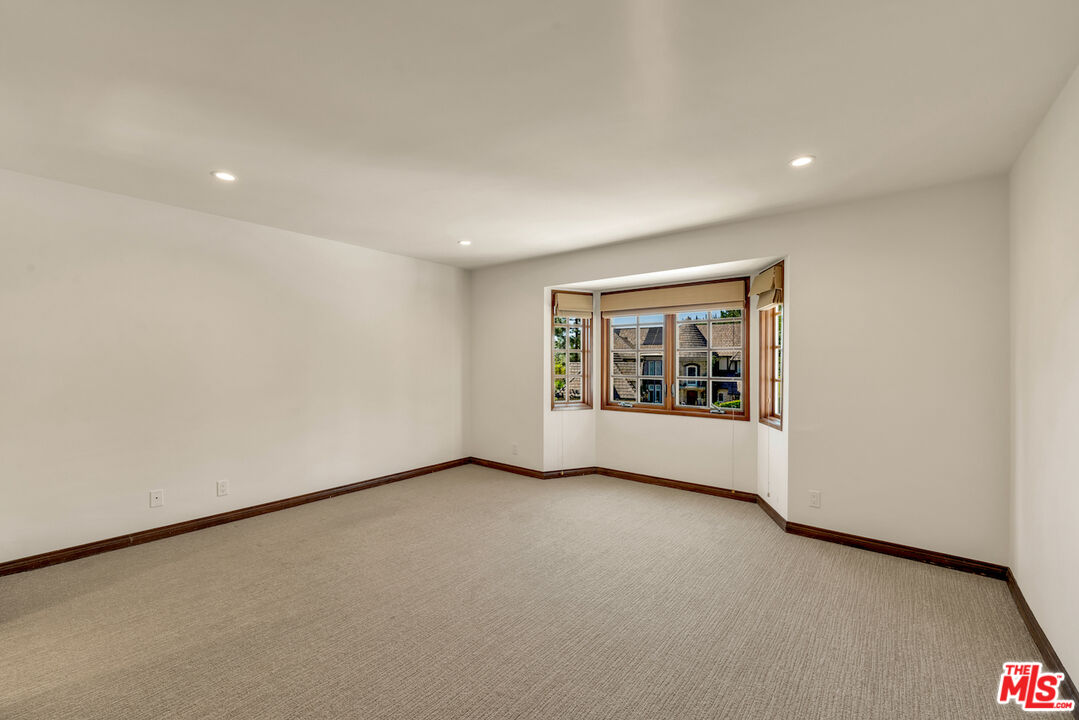 3274 Hutton Drive Beverly Hills, CA 90210 - Photo 21 of 23 a view of an empty room with a window
