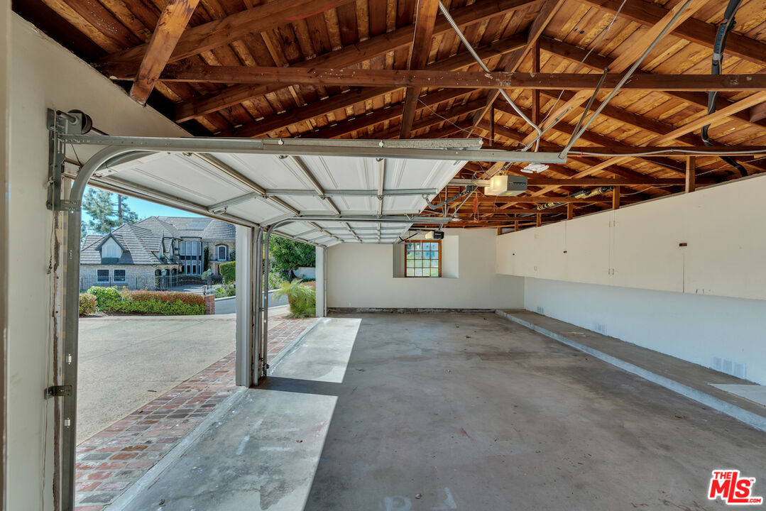 3274 Hutton Drive Beverly Hills, CA 90210 - Photo 23 of 23 a view of a room with a garage