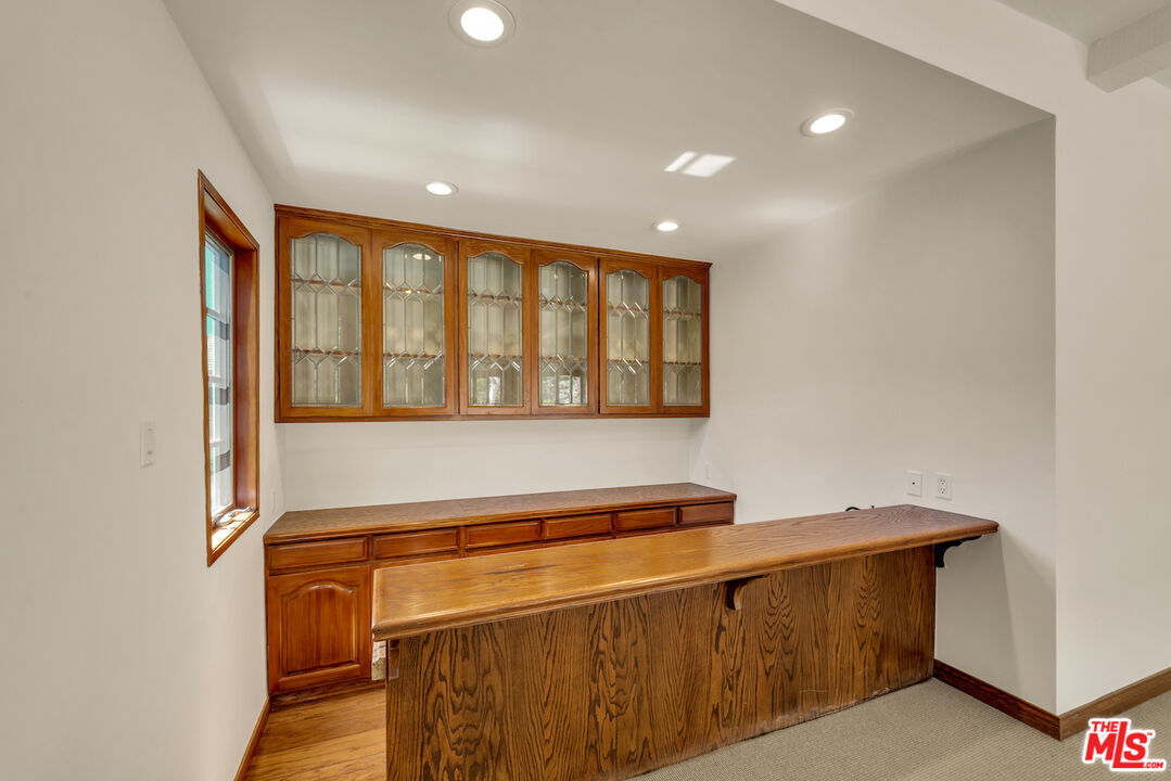 3274 Hutton Drive Beverly Hills, CA 90210 - Photo 7 of 23 a view of utility room and wooden floor