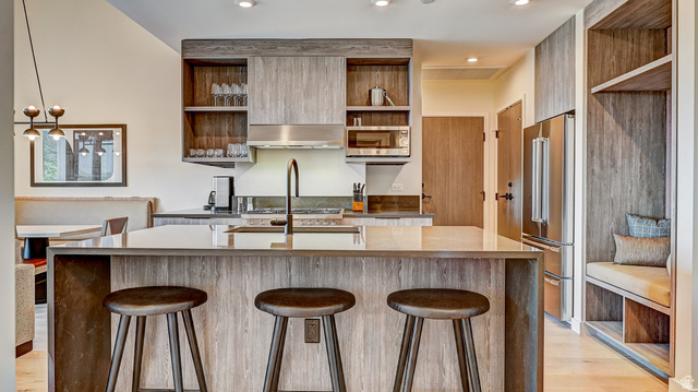 2417 West High Road, Unit 2515 Park City, UT 84098 - Photo 26 of 67 Kitchen featuring open shelves, dark stone countertops, stainless steel appliances, and recessed lighting