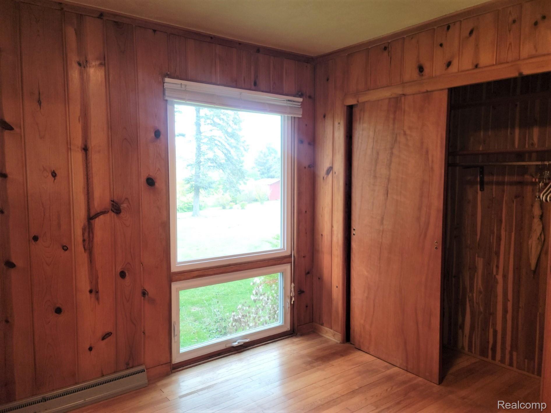 2852 North Lakeshore Road Port Hope, MI 48468 - Photo 18 of 38 Master bedroom has a cedar closet