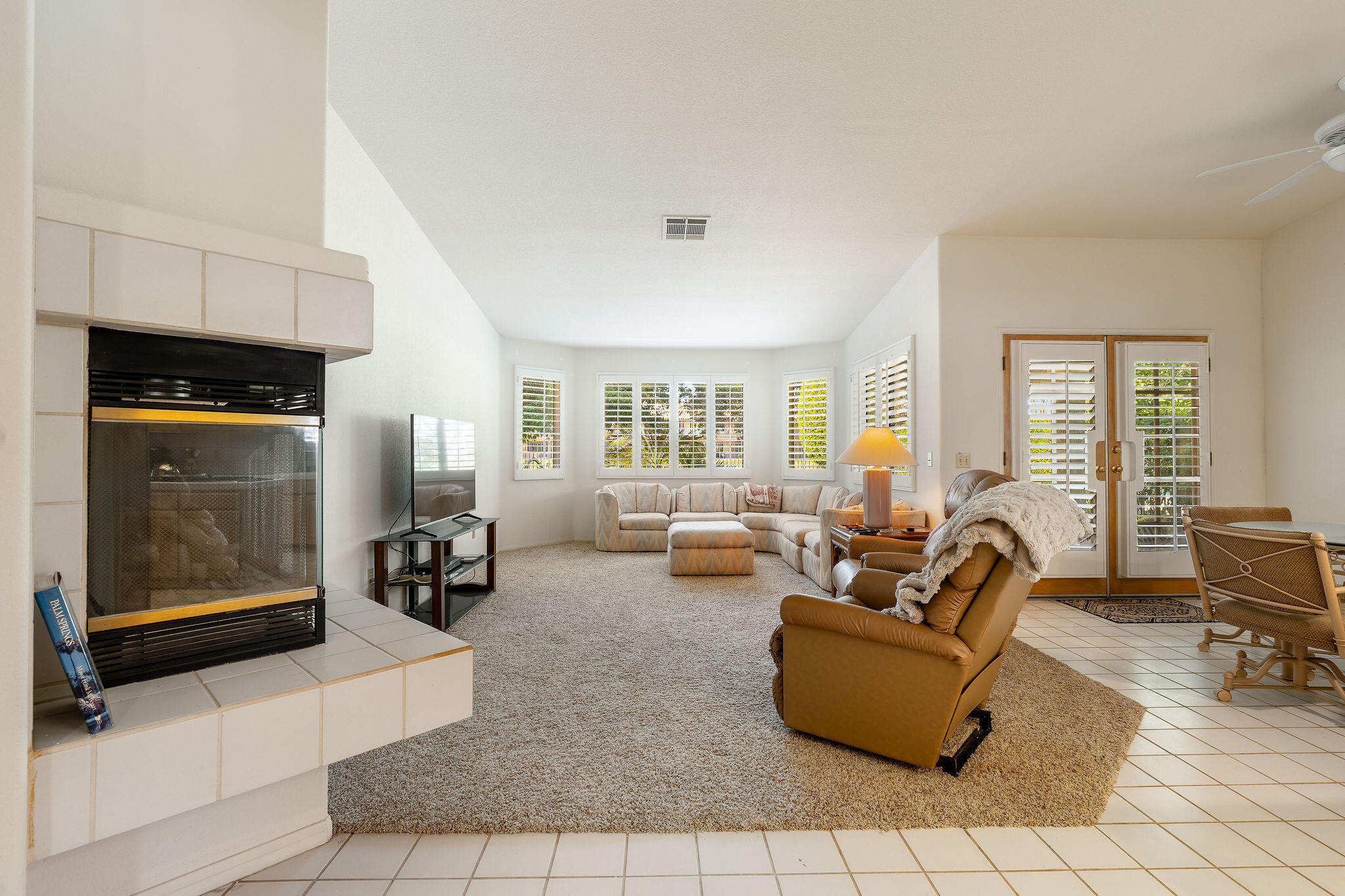 82151 Hanson Drive Indio, CA 92201 - Photo 11 of 38 a living room with furniture and a window