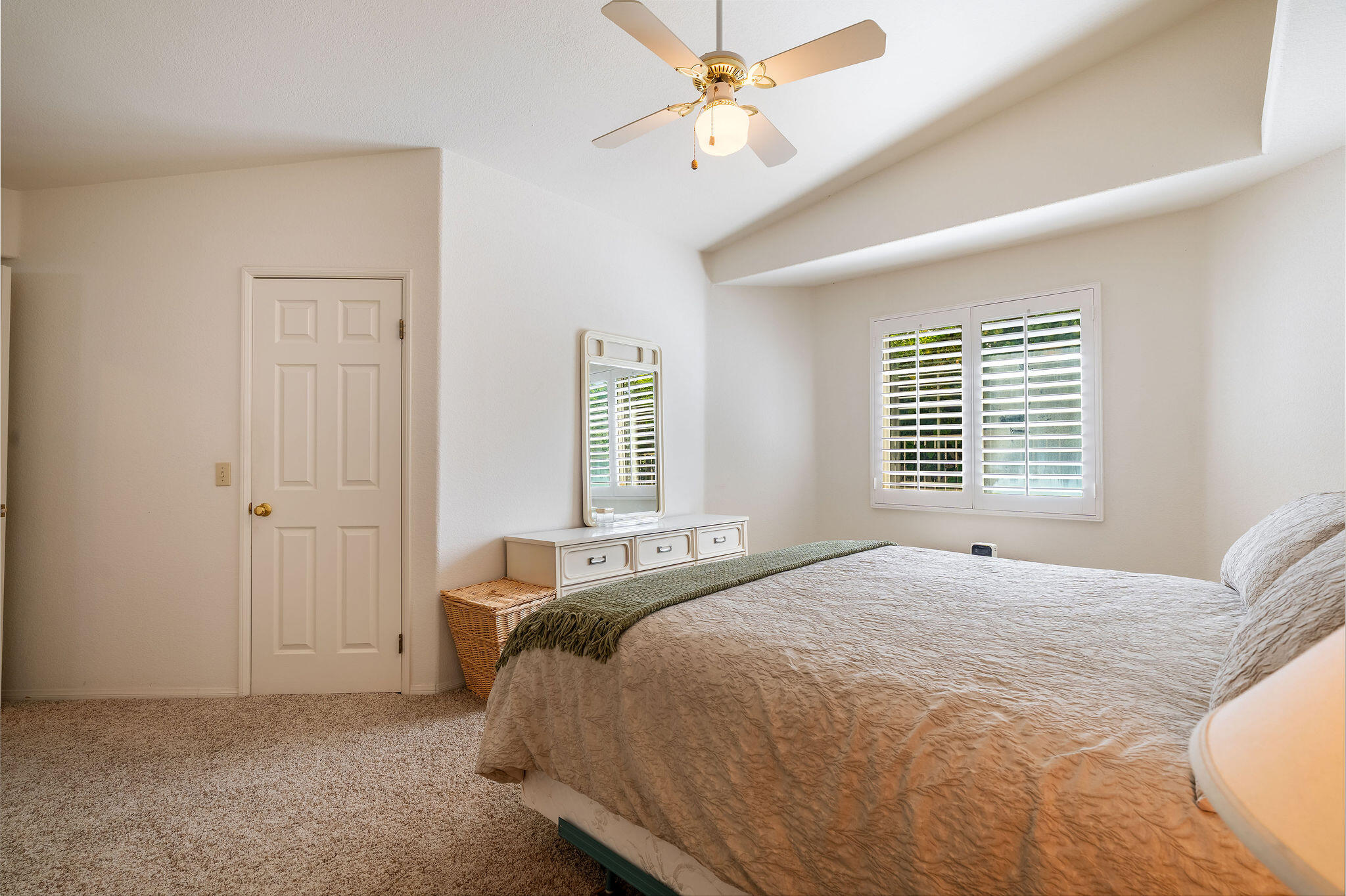 82151 Hanson Drive Indio, CA 92201 - Photo 25 of 38 a bedroom with a bed and a window