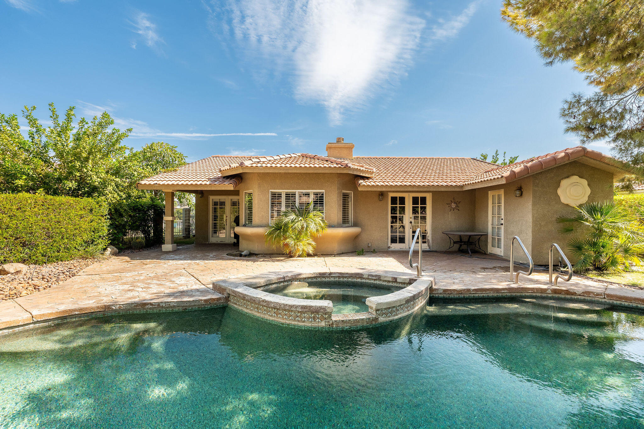 82151 Hanson Drive Indio, CA 92201 - Photo 32 of 38 a view of a house with swimming pool and sitting area