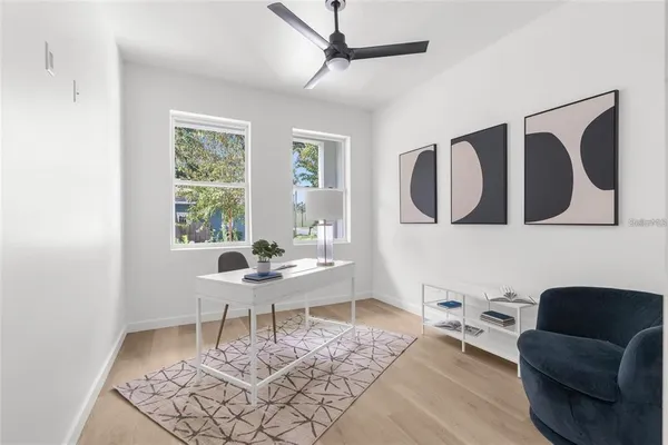 a living room with furniture and a window