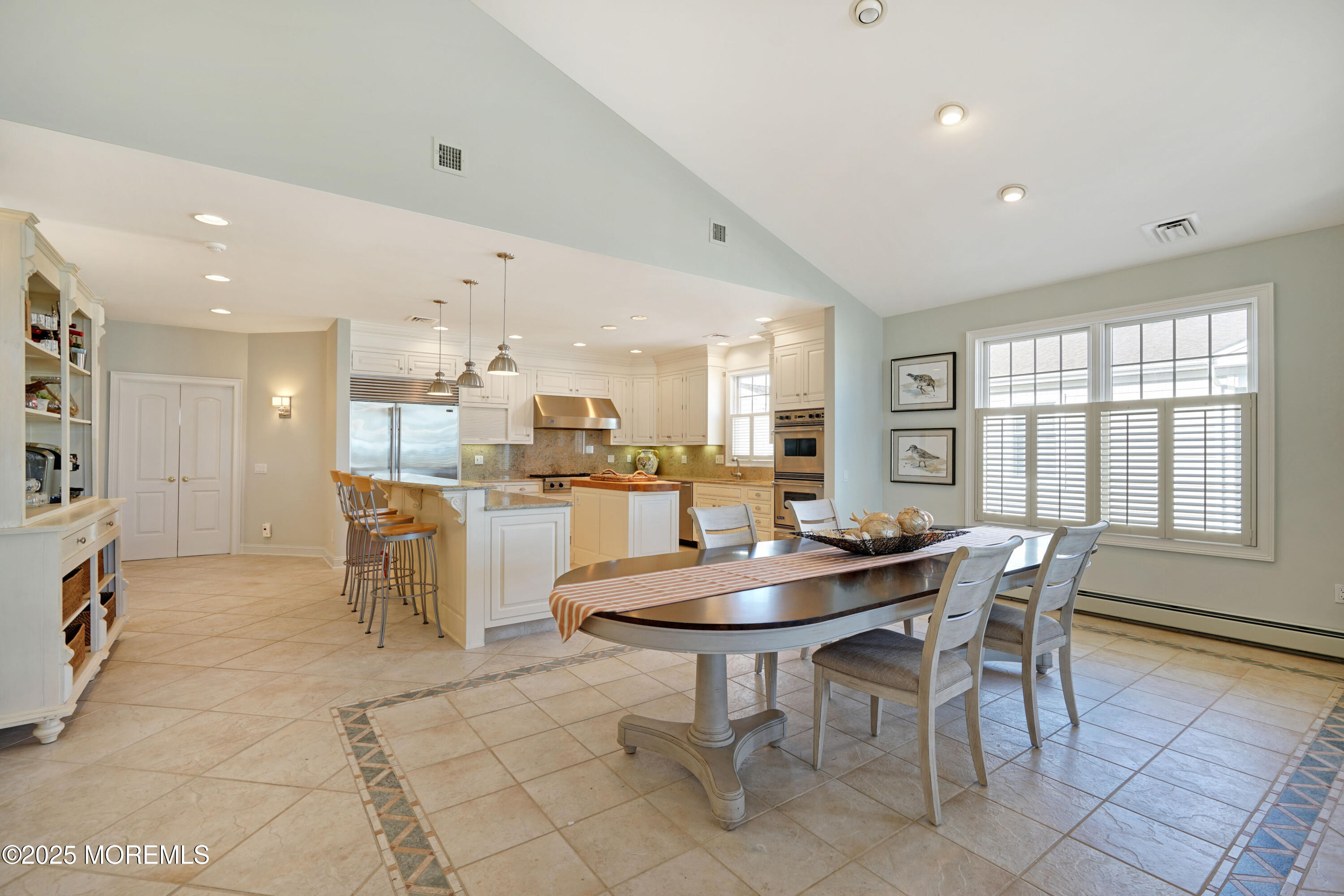 233 Beach Front, Unit 3 Manasquan, NJ 08736 - Photo 13 of 18 a view of a dining room with furniture