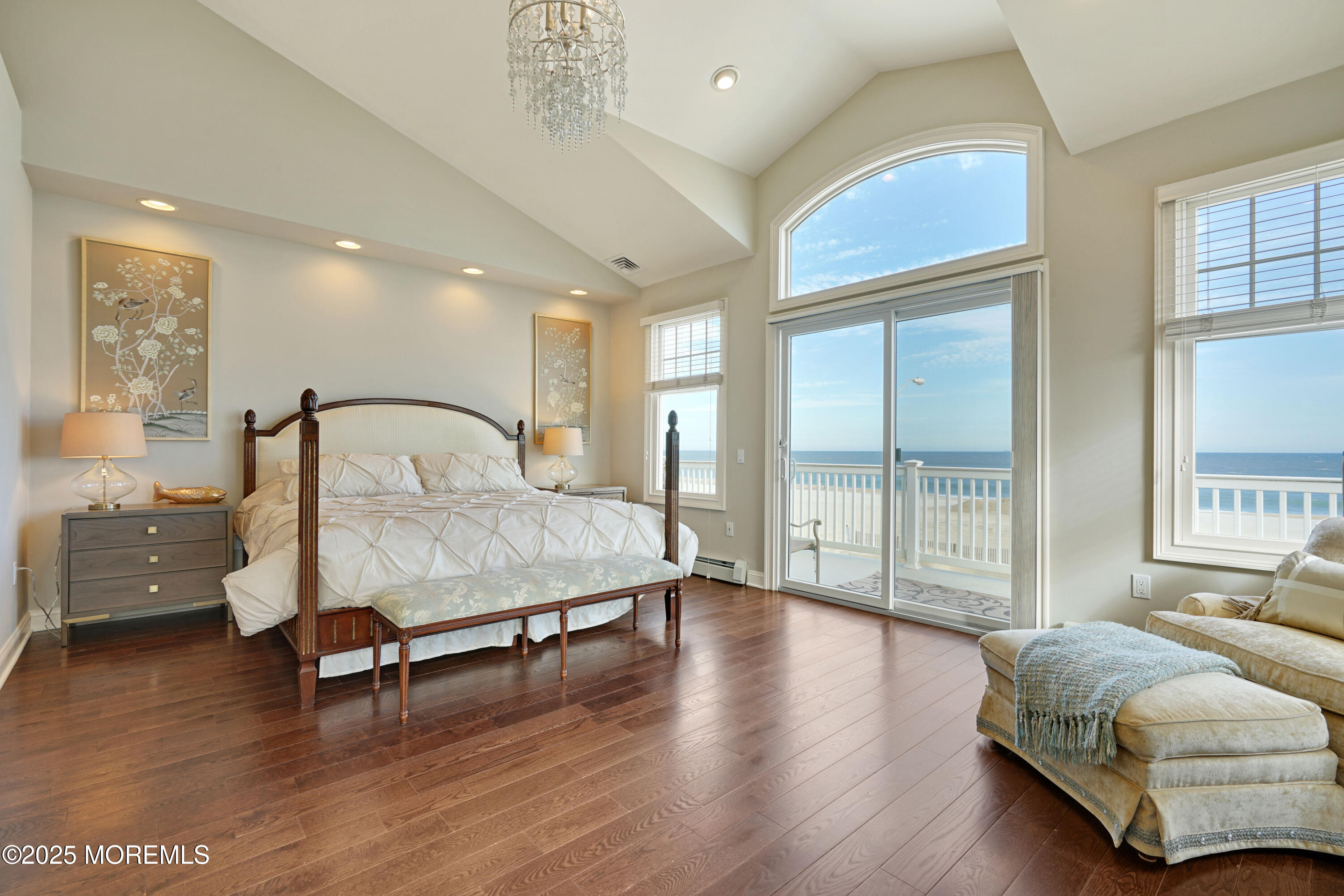 233 Beach Front, Unit 3 Manasquan, NJ 08736 - Photo 16 of 18 a bedroom with wooden floor and a large window