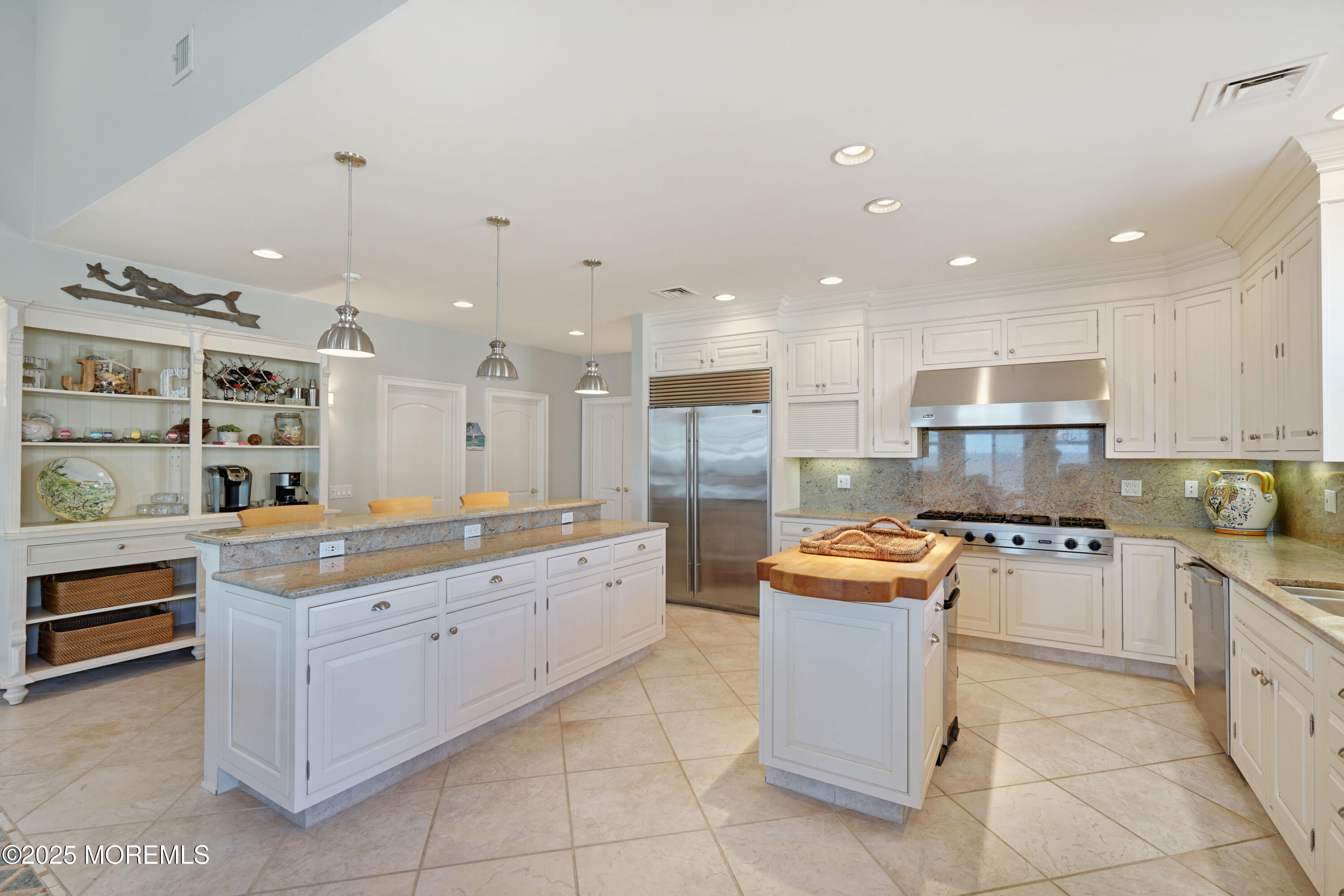 233 Beach Front, Unit 3 Manasquan, NJ 08736 - Photo 6 of 18 a open kitchen with stainless steel appliances granite countertop a stove and a sink